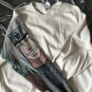 Anime embroidered sleeve on Nike pullover sweater